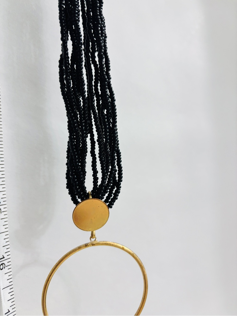 Black Beaded Necklace with Gold Hoop Pendant